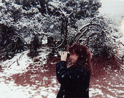 Susan taking pictures of snow in Sedona